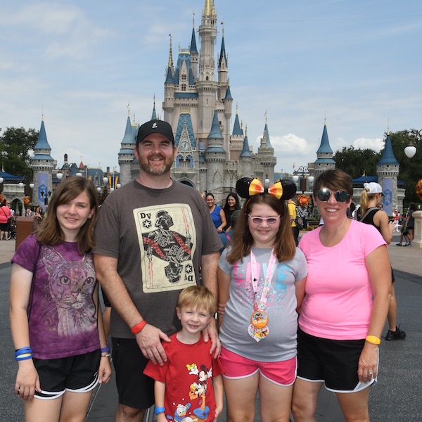 The Gruber family at Disney World in from of Cinderella's Castle.